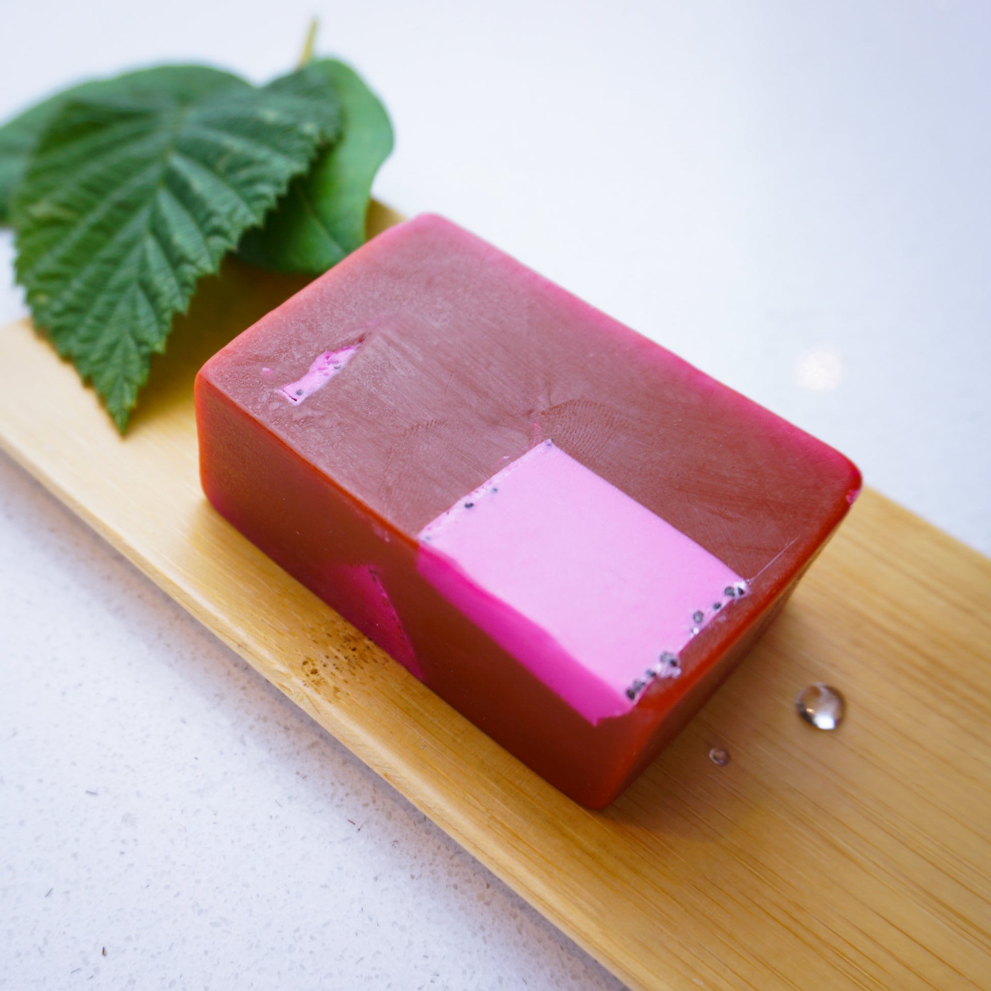 Black Raspberry & Vanilla Soap Bar on bamboo tray