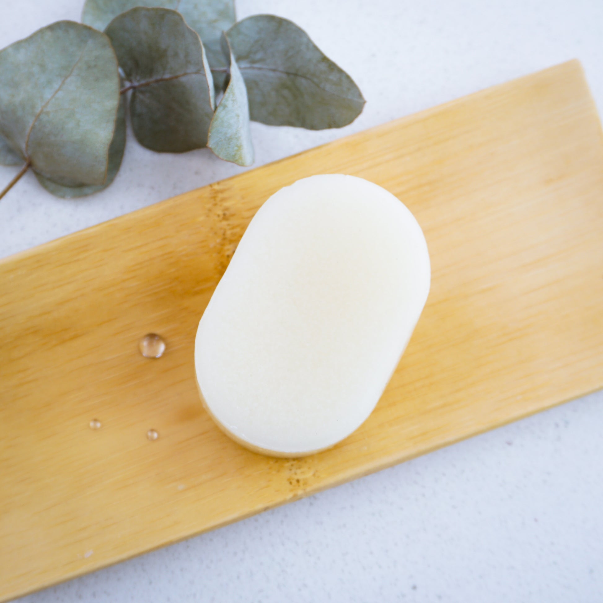 Eucalyptus conditioner bar on bamboo tray