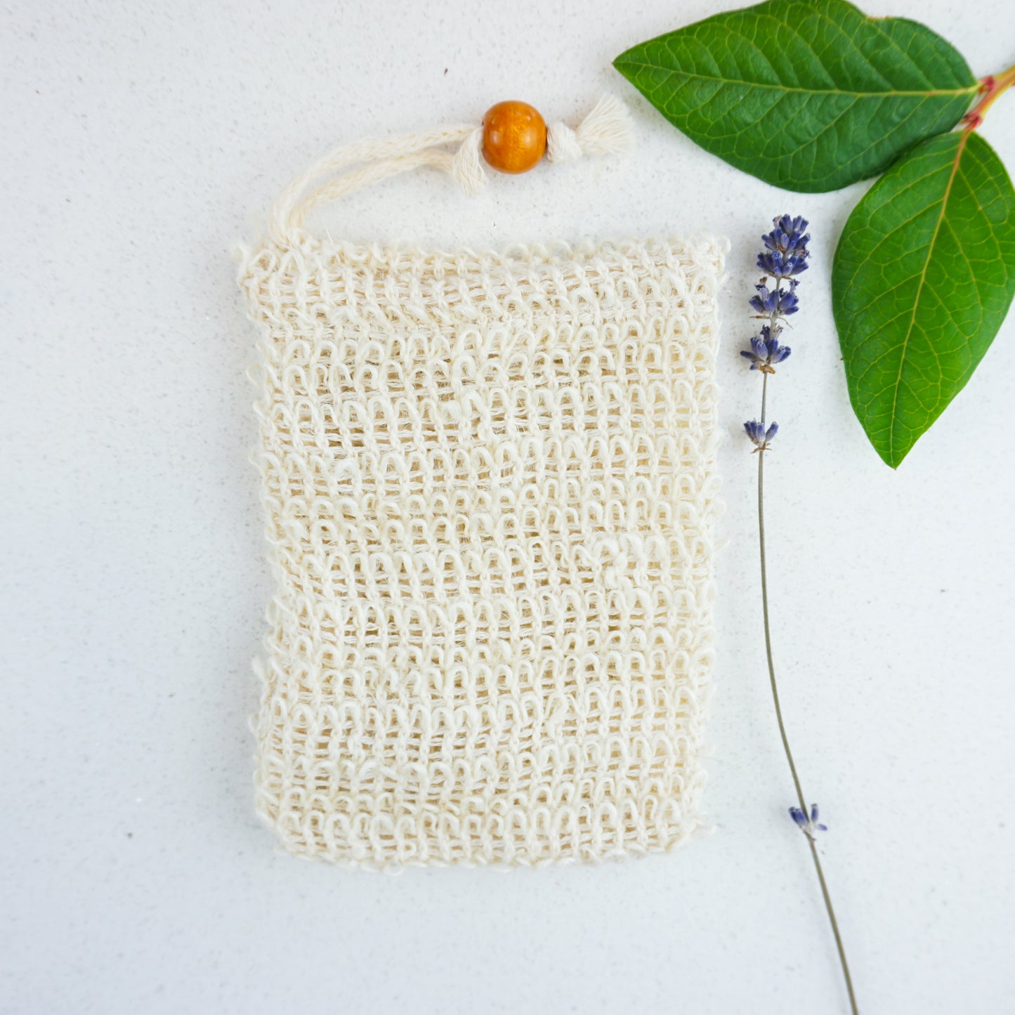 Natural Exfoliating Bag with lavender and green leaves