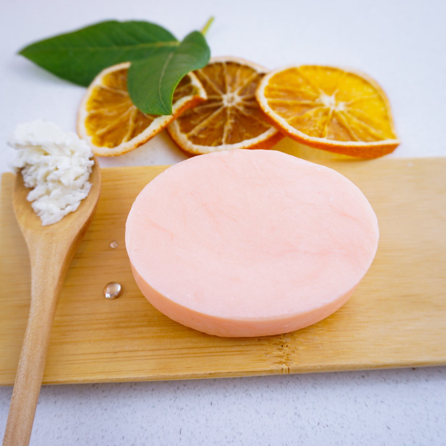 Washla Hydration Shampoo Bar with dried slices of oranges