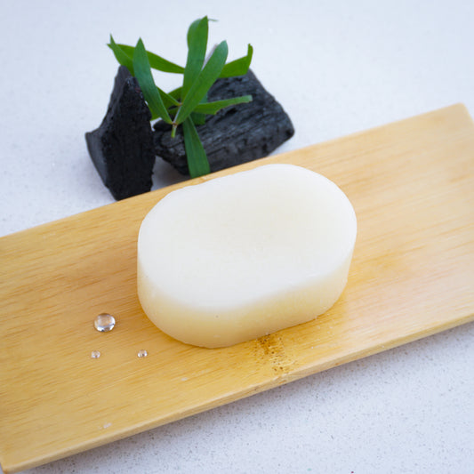 tea tree conditioner bar on bamboo tray