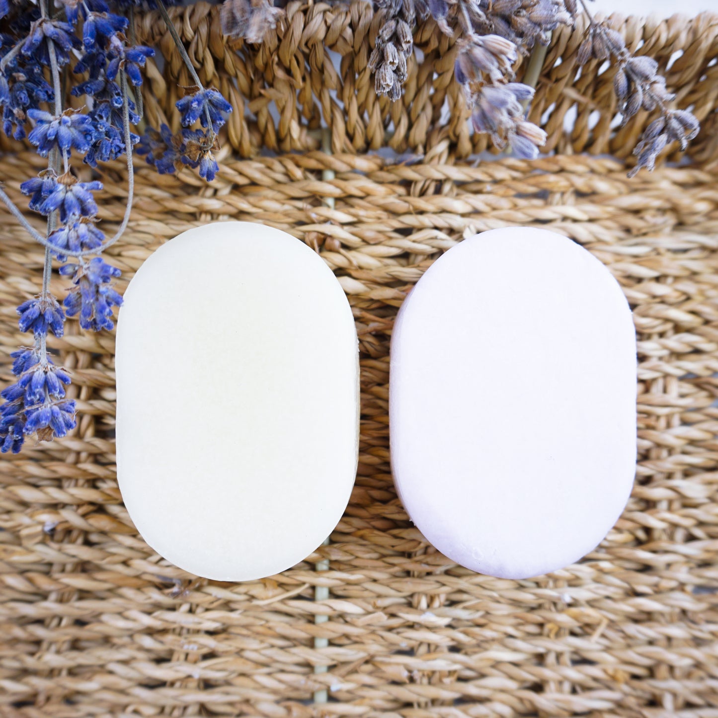 lavender shampoo and conditioner bars in hamper basket