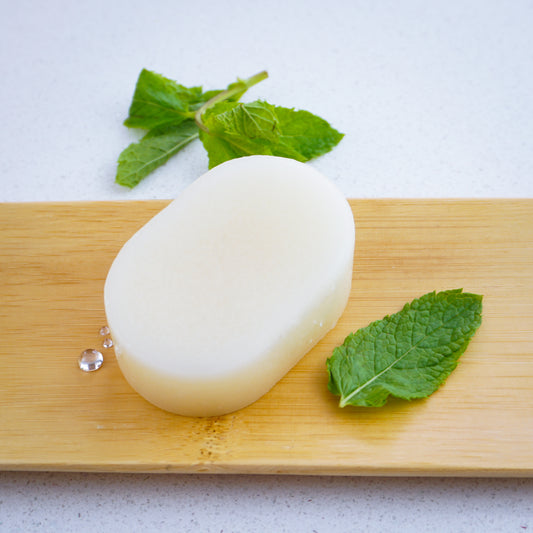 peppermint conditioner bar with mint leaves