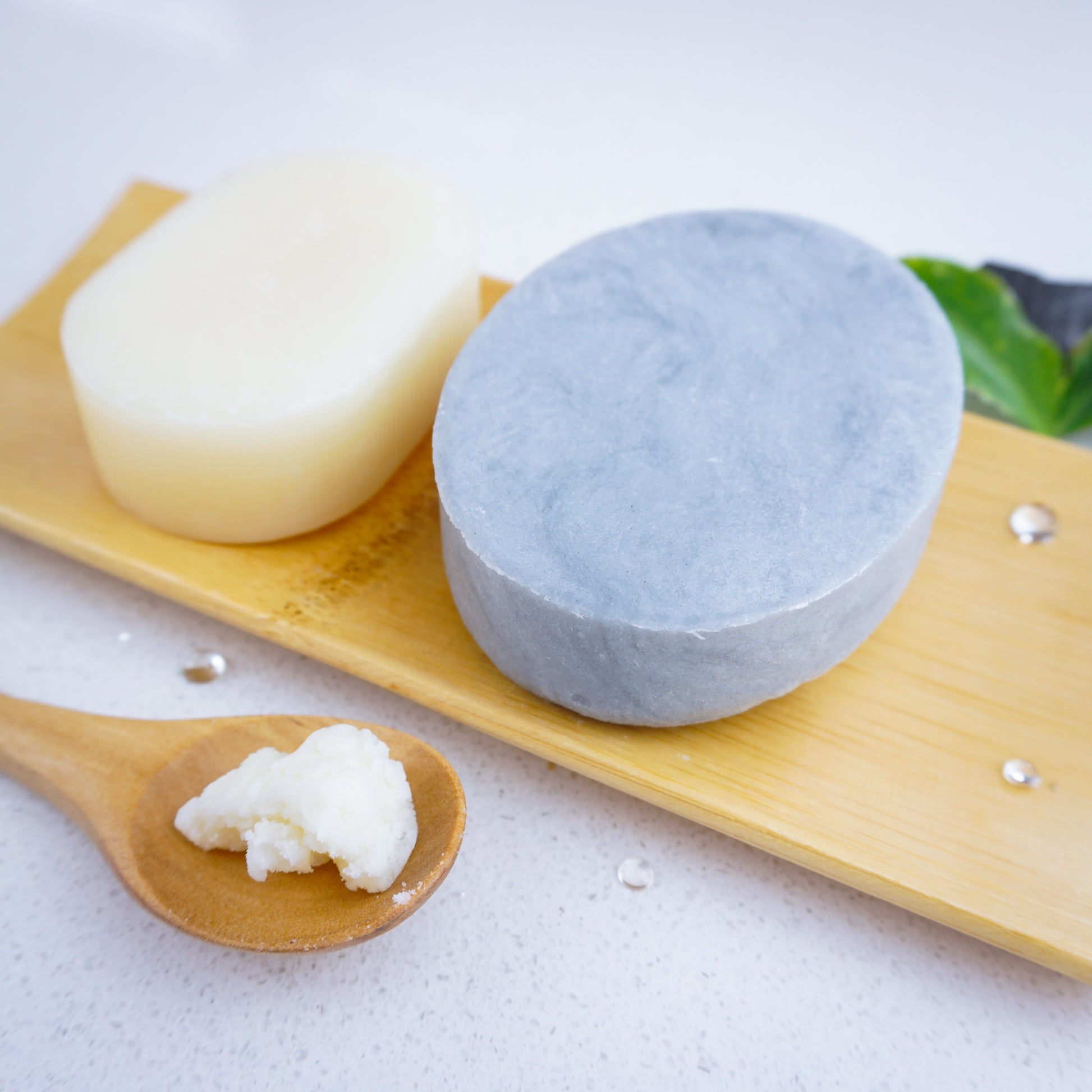 Tea Tree shampoo bar with added shea butter and a conditioner bar.