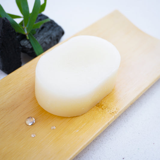 tea tree conditioner bar on a wooden dish