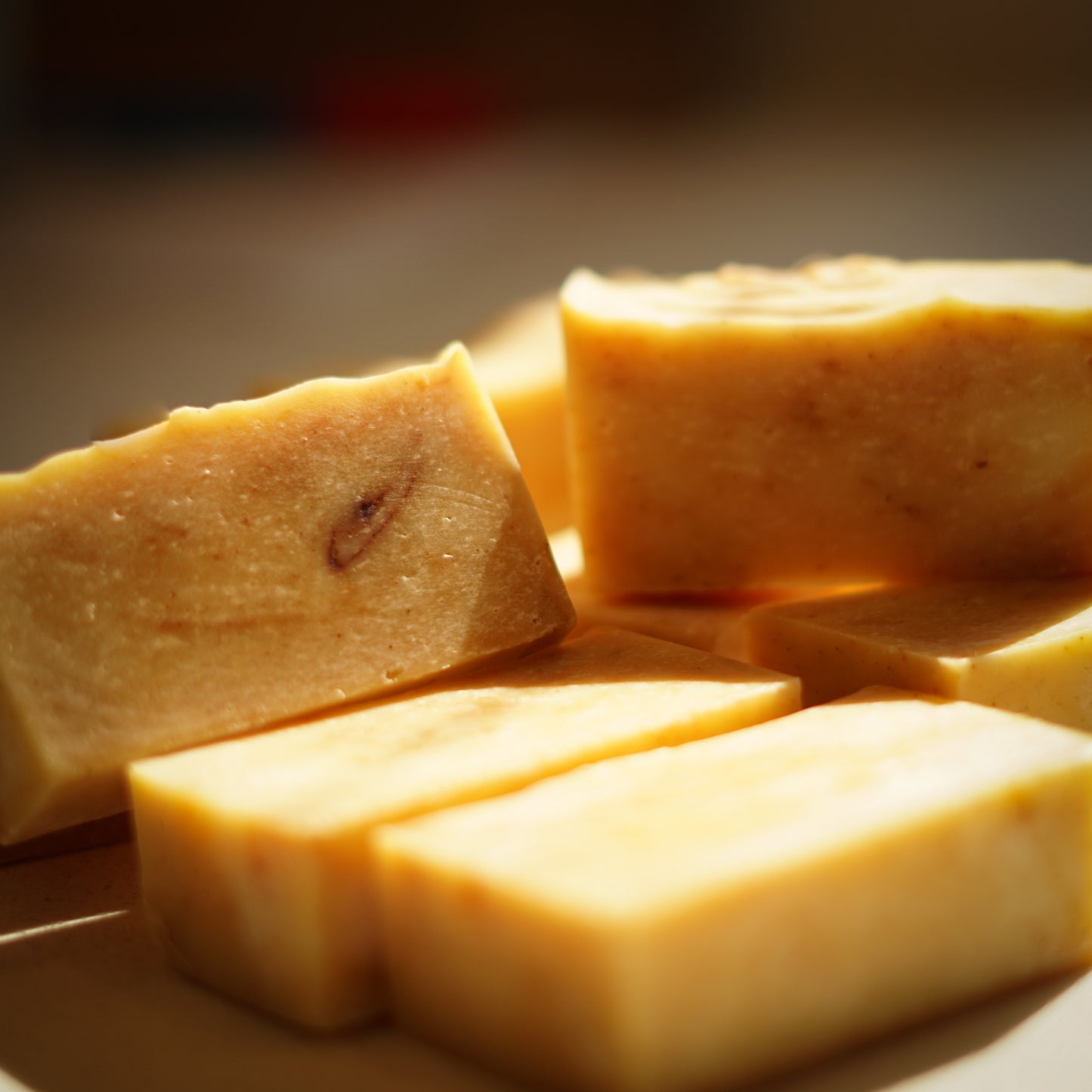 Turmeric soap bars on top of each other